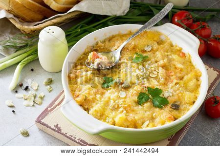 Casserole Crumble With Red Fish, White Bread And Cheese On Stone Or Slate Background. Proper Nutriti