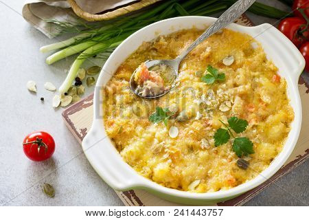 Casserole Crumble With Red Fish, White Bread And Cheese On Stone Or Slate Background. Proper Nutriti