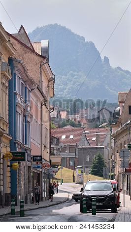 Bilina, Czech Republic - May 12, 2018: Cars, People, Historical Houses In Seifertova Street And High