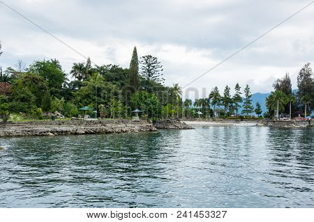 View Of Island Samosir On Lake Toba, Located In The Middle Of The Northern Part Of The Indonesian Is