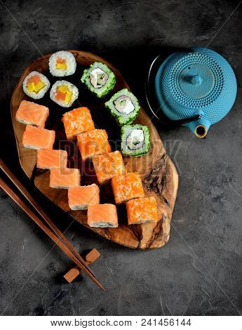 Sushi Philadelphia And California On A Wboard.ooden Olive