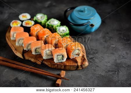 Sushi Philadelphia And California On A Wboard.ooden Olive