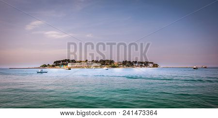 Sveti Nikola Island Near Porec, Croatia With Hotel Resort And Boats In Front, Panorama Of Porec Bay