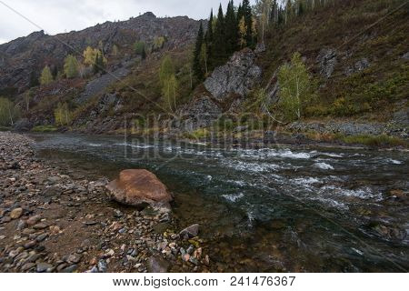 Beauty view on Kolyvan lake - a lake at the foot of the northern slope of the Kolyvan Ridge in the Altai Territory of Russia