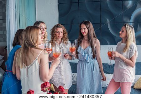 Girls Party. Beautiful Women Friends Having Fun At Bachelorette Party. They Are Celebrating And Drin