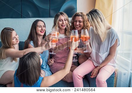 Girls Party. Beautiful Women Friends Having Fun At Bachelorette Party. They Are Celebrating And Drin