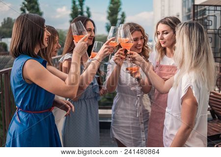 Girls Party. Beautiful Women Friends Having Fun At Bachelorette Party. They Are Celebrating And Drin