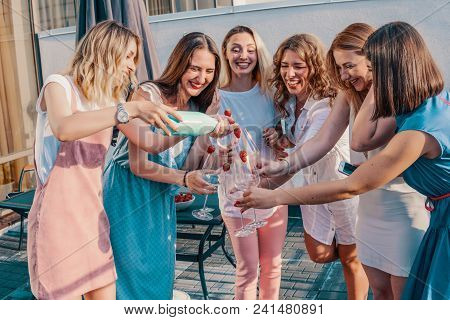 Girls Party. Beautiful Women Friends Having Fun At Bachelorette Party. They Are Celebrating And Drin
