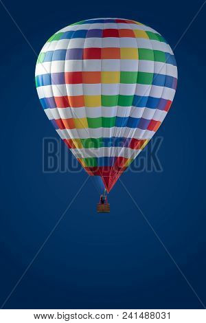Hot Air Balloon In Blue Sky. Colourfull Hot Air Balloon Isolated On Blue Background. Colourfull Ball