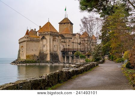 Ancient Chillon Castle At Lake Geneva In The Town Of Montreux, Switzerland