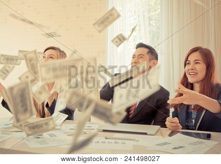 Business Team Parter Celebrating Profit By Throwing Money