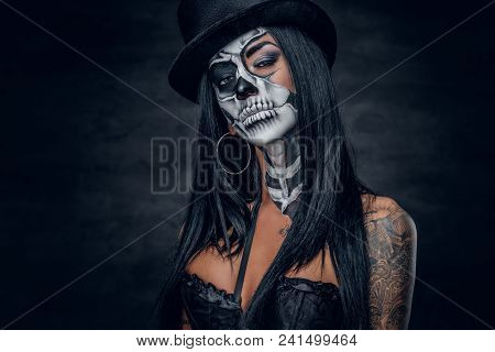 Portrait Of Zombie Woman With Painted Skull Face.