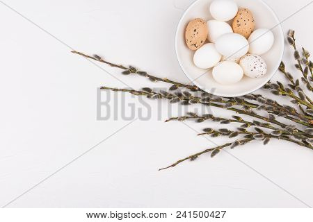 Stylish Background With White And Brown Eggs In Bowl, And Goat Willow Branches With Copy Space. Isol