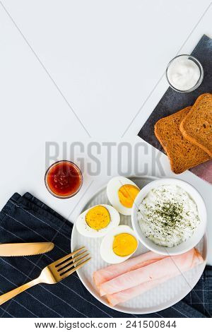 Breakfast, Half Boiled Eggs, Ham, Fresh Cheese Sprinkled With Dill, Toast, Horseradish Sauce And Swe