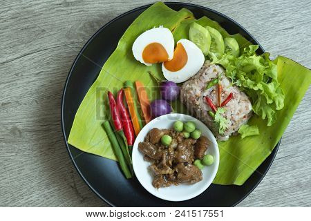 Top View Of A Dish Of Delicious Thai Spicy Shrimp Paste Fried Rice On Table