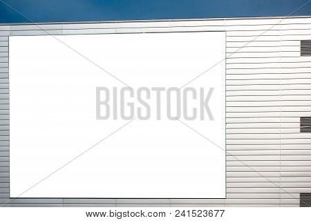 Mock Up. Blank Vertical Billboard, Poster Frame, Advertising On The Wall Of Industrial Style Buildin