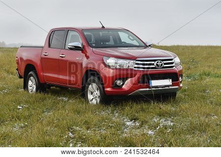 Slany, Czech Republic - November 10, 2016: Red Toyota Hilux In Slany, Czech Republic, November 10, 2