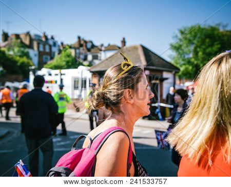 Windsor, United Kingdom - May 19 2018: Senior Woman With Crown Heading Royal Wedding Marriage Celebr
