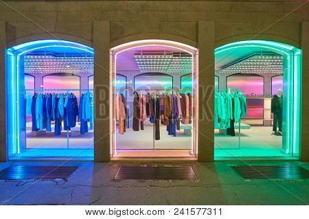 MILAN, ITALY - CIRCA NOVEMBER, 2018: shop windows display of clothing at a store in Milan, Italy.