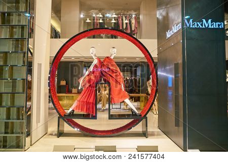 MILAN, ITALY - CIRCA NOVEMBER, 2018: shop window display of clothing at MaxMara store in Milan, Italy.