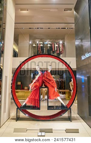MILAN, ITALY - CIRCA NOVEMBER, 2018: shop window display of clothing at MaxMara store in Milan, Italy.