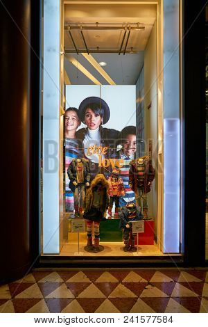 MILAN, ITALY - CIRCA NOVEMBER, 2018: shop window display of clothing at GAP store in Milan, Italy.