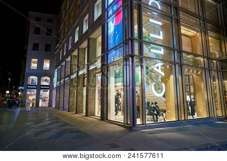 MILAN, ITALY - CIRCA NOVEMBER, 2018: shop windows display of clothing at a store in Milan, Italy.