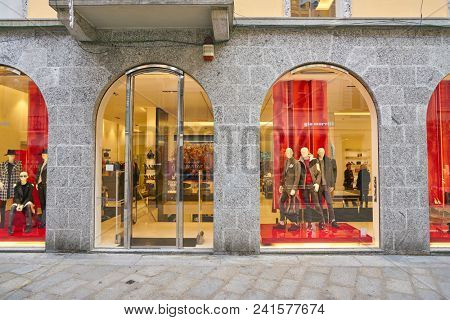 MILAN, ITALY - CIRCA NOVEMBER, 2018: shop windows display of clothing at a store in Milan, Italy.