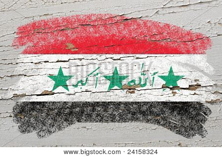 Flag Of Iraq On Grunge Wooden Texture Painted With Chalk