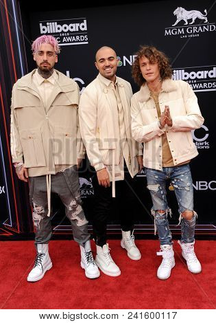 KEVI, Matthew Russell and Trevor Dahl of Cheat Codes at the 2018 Billboard Music Awards held at the MGM Grand Garden Arena in Las Vegas, USA on May 20, 2018.