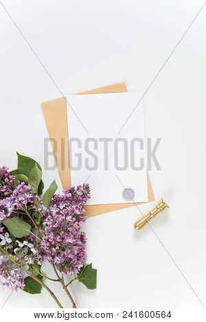 Top View With Card, Paper, Stemp And Lilac