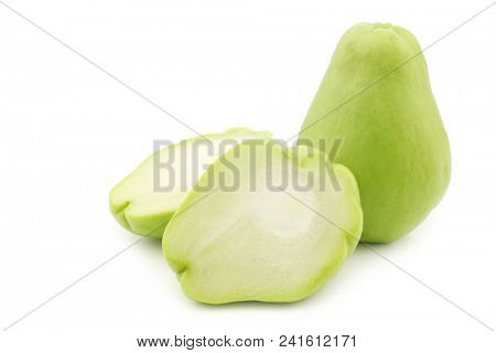 Chayote fruit (Sechium edulis)and a cut one on a white background