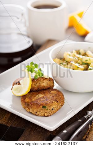 Crab Cakes With A Side Of Potatoes