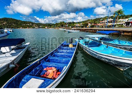 Beautiful View Of Several Fishing Boats On Water In Samana, Dominican Republic
