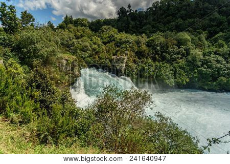 Scenic Shot Of Beautiful Waterfall In Forest, Huka Falls, New Zealand