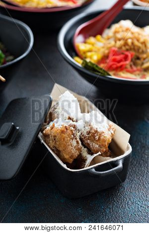 Asian Style Fried Donuts Or Beignets With Powdered Sugar