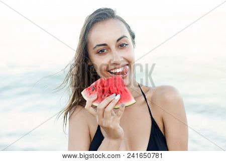 Summer Vacation - Young Girl Eating Fresh Watermelon On Sandy Beach