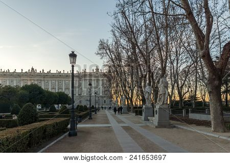 Madrid, Spain - January 22, 2018: Sunset View Of Gardens Of Cape Noval And Royal Palace In City Of M