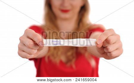 Pregnant Test. Happy Woman Showing A Positive Pregnancy Test