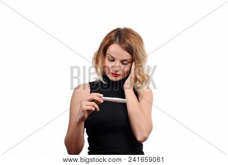 Shocked Upset Woman Looking At Pregnancy Test