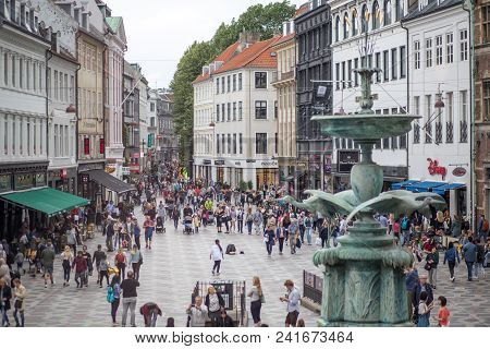 Copenhagen, Denmark - July 30, 2017: People On Main Pedestrian And Shopping Street Called Stroget In