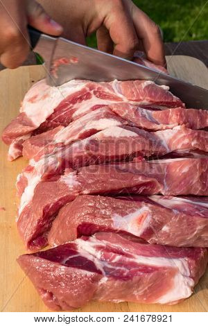 Overhead View Of Raw Piece Of Pork On Wooden Background. Piece Of Fresh Boneless Pork, Neck Part Or 