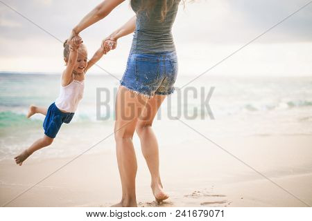 Mom And Baby Playing Near Beach. Traveling With Family, Child