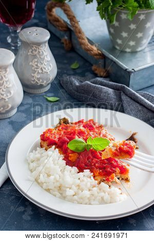 Flounder With Tomato Sauce And Boiled Rice, Selective Focus