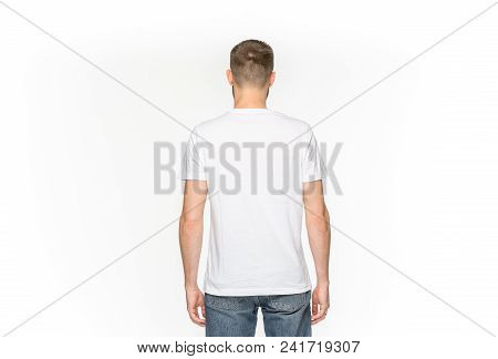 Closeup Of Young Man's Body In Empty White T-shirt Isolated On White Background. Mock Up For Disign 
