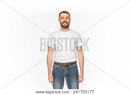 Closeup Of Young Man's Body In Empty White T-shirt Isolated On White Background. Mock Up For Disign 