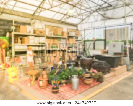Blurred Plant Nursery, Tool And Equipment At Garden Center In Usa