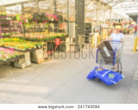 Blurred Plant Nursery, Tool And Equipment At Garden Center In Usa