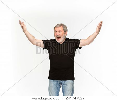 Closeup Of Senior Man's Body In Empty Black T-shirt Isolated On White Background. Mock Up For Disign