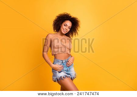 Portrait Of Attractive Charming Cheerful Lovely  Girl With Afro Haidress Dressed In Modern Cool Knit